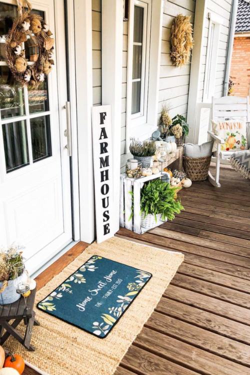 farmhouse fall front porch with farmhouse sign