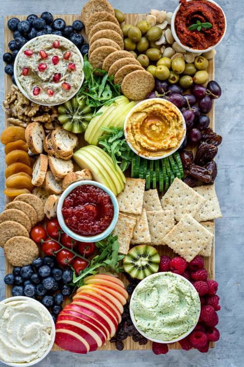 vegan charcuterie board with veggies and dips