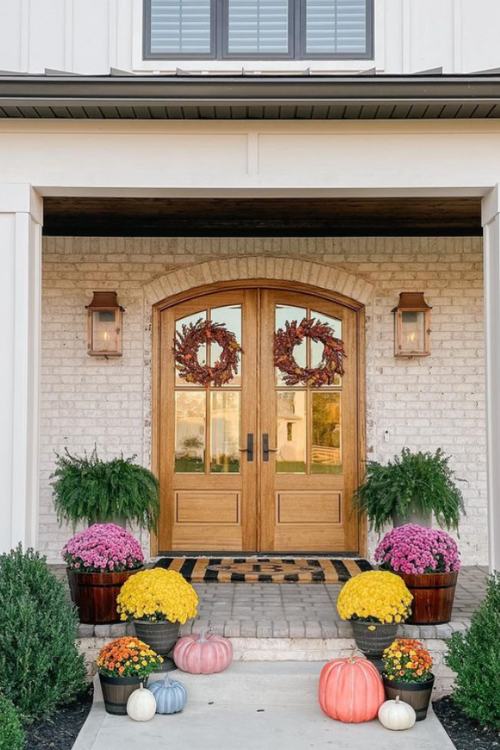 fall front porch colorful potted plants