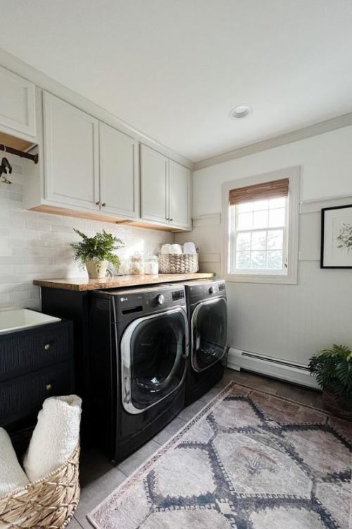 white laundry room with antique rug