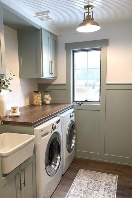 laundry room with brass light fixture on ceiling