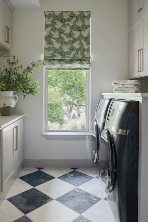 laundry room with printed roman shades