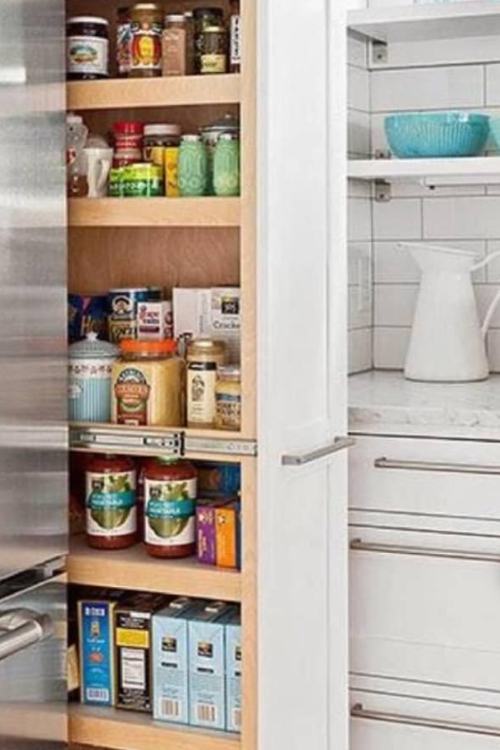 pull out storage between fridge and wall for small kitchen storage